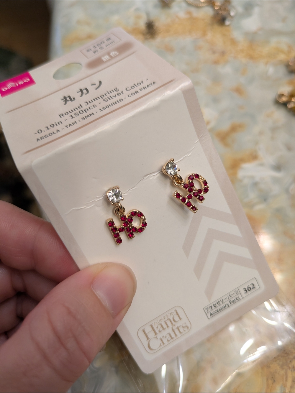 Gold-tone HO Christmas Drop Earrings with Clear Stones Studs
